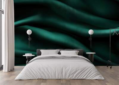   The image features a close-up of a green fabric with a textured wavy pattern in its center, against a black backdrop Wall mural