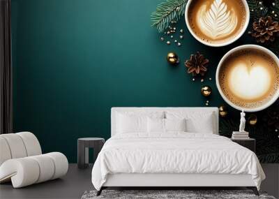   Two cups of cappuccino on a green background with pine cones and Christmas decorations surrounding them Wall mural