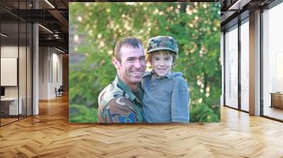 military father holding son Wall mural