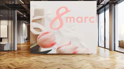 8 march. Happy womens day greeting card. 8 march text on pink tulips and gift box with ribbon on white background. Stylish tender image. Handwritten text, lettering Wall mural