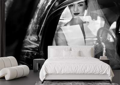 elegant handsome stylish groom holding gently gorgeous bride. unusual luxury wedding couple in retro style. romantic moment. black white photo Wall mural