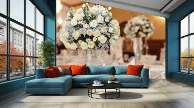 luxury wedding decor glass vase with flowers of roses and hydrangea closeup with jewels. arrangements decorations at wedding reception. expensive catering. space for text Wall mural