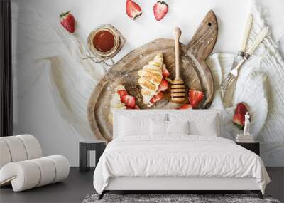 Freshly baked croissants with strawberries, mascarpone and honey Wall mural