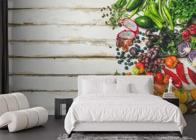 Helathy raw vegan food cooking background. Flat-lay of fresh fruit, vegetables, greens, superfoods over white wooden table, top view, copy space. Clean eating, alkaline diet, vegetarian concept Wall mural