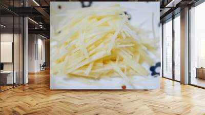 shredded potatoes in plate for cooking Wall mural