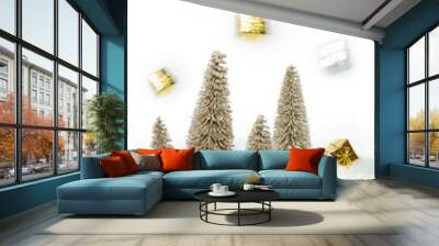 White Christmas snow landscape background with gold christmas trees and gold presents, falling presents and stars in the snow Wall mural