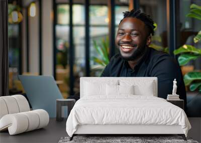 Candid portrait of a black man working on a laptop in a stylish modern cafe hotel lobby, African american digital nomad on a virtual video call meeting with colleagues, generative ai Wall mural