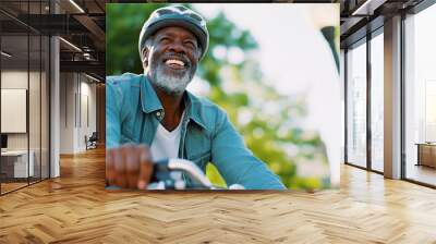 Happy mature senior black african american man riding his bicycle through a park on a sunny day, ai generated Wall mural