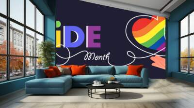 Pride Month banner with a hand holding rainbow, lesbian, transgender flag hearts and continuous line drawing on dark background for LGBTQIA. Vector illustration. Wall mural