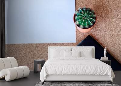 Cactus paper and phone on wood table Wall mural