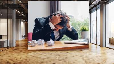 Asian young business man tired strain failure on he work Wall mural