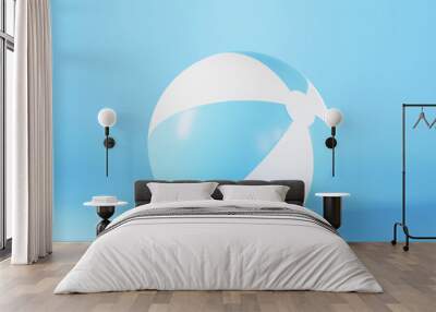 Blue inflatable beach ball mockup light sphere toy for sport game summer on blue background, holiday summer icon, 3D rendering illustration Wall mural