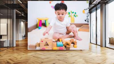 Child boy building playing toy blocks wood Wall mural