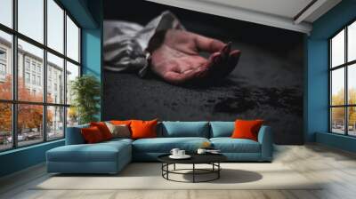 Closeup hand with blood of horror bloodthirsty ghost woman on floor, Homicide female hands jerky in blood with resentment torture and ask for help, murder and crime, Halloween horror day concept Wall mural