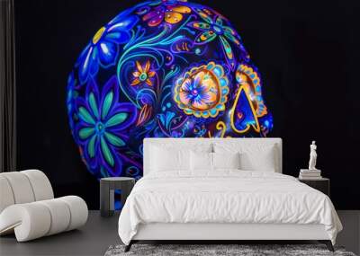 Glowing sugar skull with vibrant blue and purple flowers, ornate details, dark backdrop Wall mural