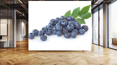 Pile of blueberries with leaves isolated on white Wall mural