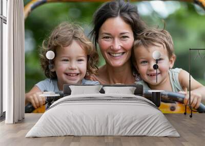 Family adventure  mother and two kids enjoy thrilling rollercoaster ride full of laughter and joy Wall mural