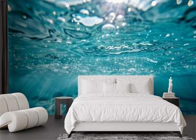 Underwater photograph of an olympic pool, capturing the submersion in the aquatic depths Wall mural