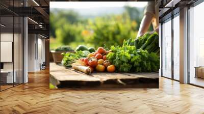 Unidentified chef picking ripe vegetables in a lush organic farm surrounded by scenic landscapes Wall mural