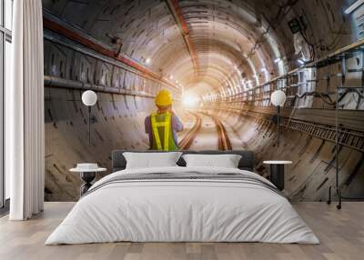 Soft focus and blurred lighting background of focus at engineer or technician control. Underground tunnel infrastructure. Transport pipeline by Tunnel Boring Machine for electric train subway Wall mural