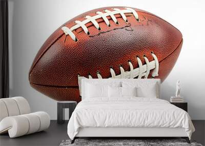 A close-up view of a classic brown football with white laces, perfect for sports and athletic themes. Wall mural