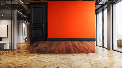 A modern interior showcasing an orange wall and a black door, highlighting contemporary design and vibrant color schemes. Wall mural