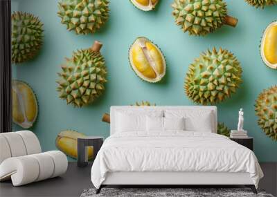 A close up of a bunch of durians with one of them cut open Wall mural