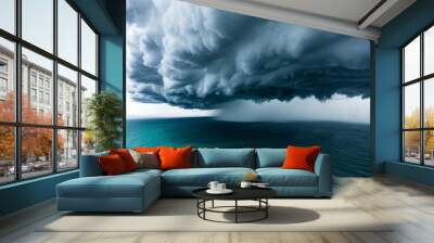 A dramatic storm cloud looms over a serene ocean, creating a stunning contrast of nature's power and beauty. Wall mural