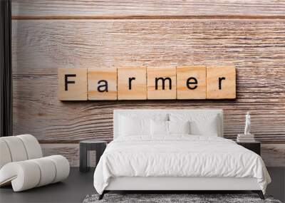 FARMER word written on wood block. FARMER text on wooden table for your desing, concept Wall mural