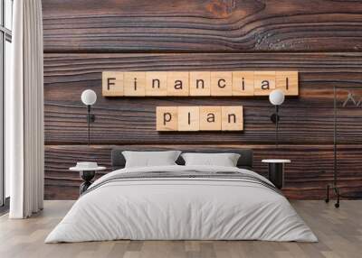 financial plan word written on wood block. financial plan text on cement table for your desing, concept Wall mural