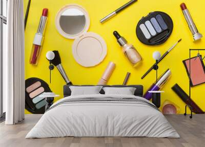 Professional makeup tools. Top view. Flat lay. Beauty, decorative cosmetics. Makeup brushes set and color eyeshadow palette on table background. Minimalistic style Wall mural