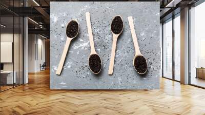 quinoa seeds in bowl and spoon on colored background. Healthy kinwa in small bowl. Healthy superfood Wall mural