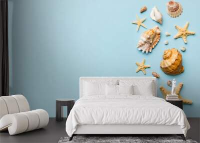 summer time concept flat lay composition with beautiful starfish and sea shells on colored table, to Wall mural