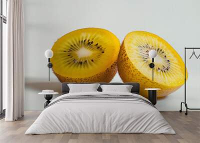 a kiwi fruit cut in half on a white surface Wall mural