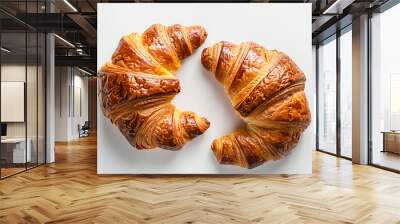 two croissants are on a white surface Wall mural