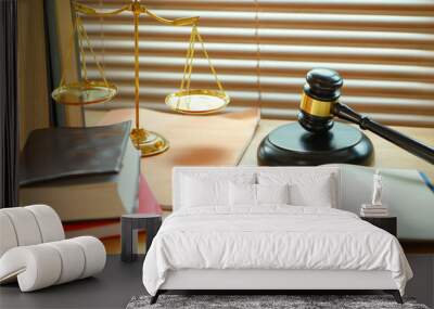 Lawyer or judge's hammer in the court. Auction's hammer and judgement golden scale are on wood table. Law subject. Judgement subject to judge people. Wall mural