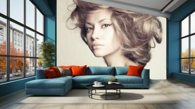 Beautiful woman with magnificent hair Wall mural