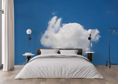 Rabbit shaped cloud in a blue sky Wall mural