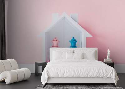 minimalist white house with pink queen and blue king chess pieces inside, simple shapes, simple pastel color background, 3d render  Wall mural