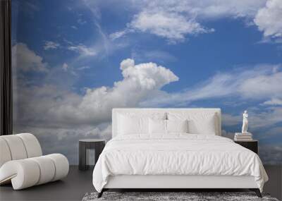 Blue sky with clouds background. Wall mural