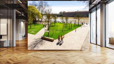 People relaxing time at public park in Toulouse, France. Wall mural