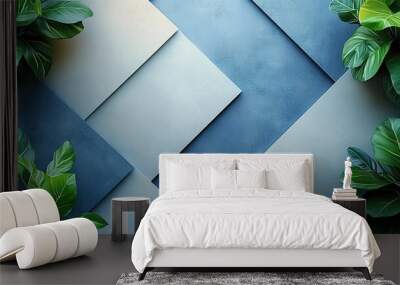 Abstract geometric background with overlapping blue squares and lush green leaves in the corners, combining nature and modern design.
 Wall mural