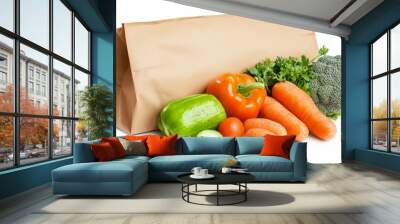 A bag of vegetables including carrots, broccoli, and peppers Wall mural