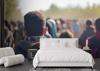 A crowd of refugees crosses the border. Backdrop with selective focus and copy space Wall mural