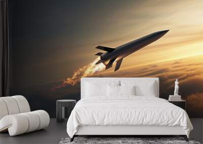 A rocket is flying through the sky with a bright orange sunset in the background, military missile Wall mural