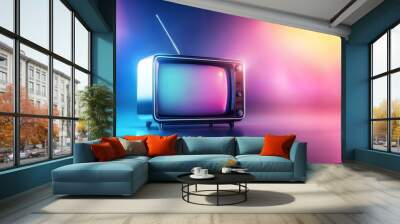 A television set with a remote control on top of it Wall mural