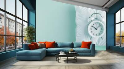 A white pillow with a clock, morning concept Wall mural