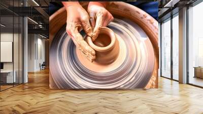 Hands Shaping Clay: A close-up of skilled hands shaping a clay pot on a potter's wheel, capturing the artistry and craftsmanship involved in the pottery-making process. 1 Wall mural