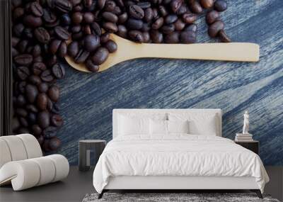 Coffee bean brown seed on wooden spoon Wall mural