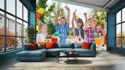 group of kids having fun at birthday party Wall mural